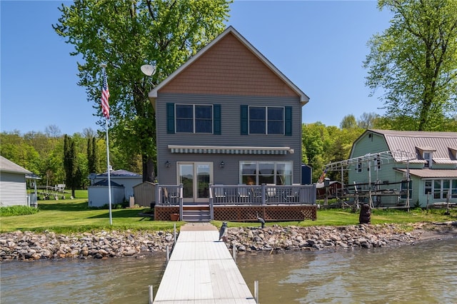 483 Indian Cv, Moravia, NY 13118 - back of house with a lawn and a deck with water view