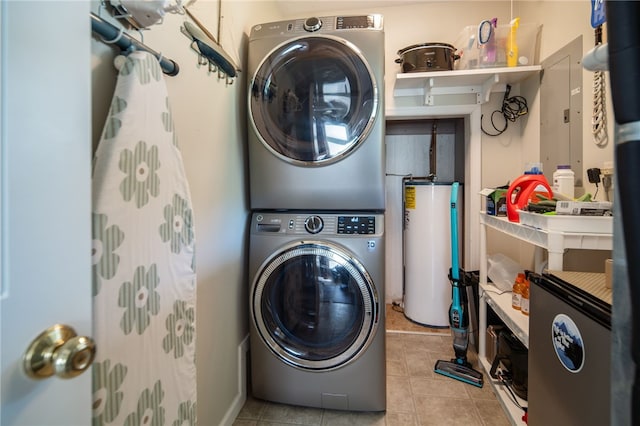 483 Indian Cv, Moravia, NY 13118 - laundry area with water heater, estacked washer and dryer, and tile patterned floors