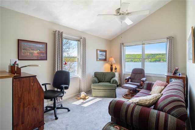 483 Indian Cv, Moravia, NY 13118 - home office with carpet floors, a ceiling fan, lofted ceiling, baseboards, and a water view