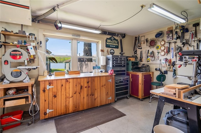 483 Indian Cv, Moravia, NY 13118 - misc room with a workshop area and finished concrete floors