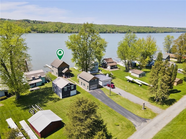483 Indian Cv, Moravia, NY 13118 - aerial perspective of suburban area with a large body of water