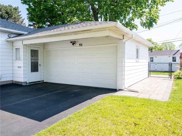 garage featuring fence