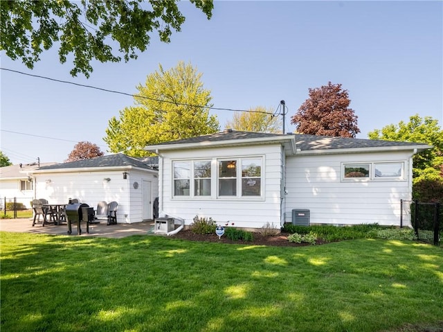 back of house with a patio and central air condition unit