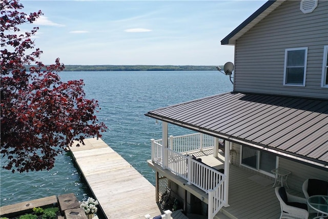 dock area featuring a water view