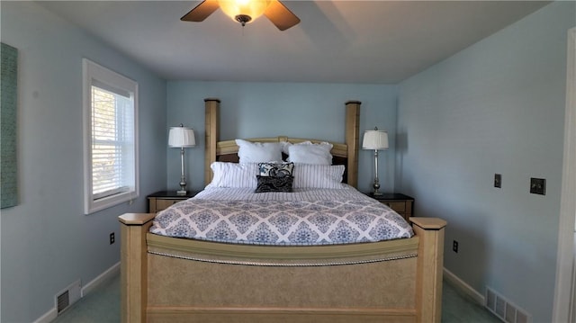 carpeted bedroom with baseboards and ceiling fan