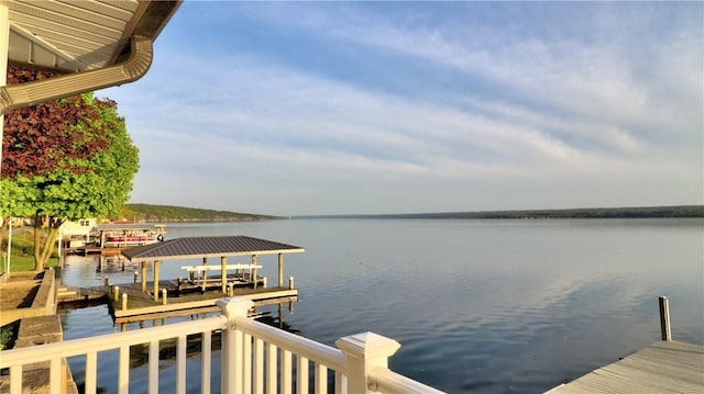 dock area featuring a water view and boat lift