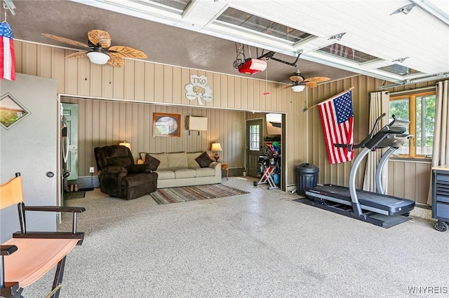 workout room with a ceiling fan