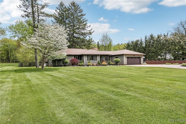 view of front of house featuring an attached garage and driveway