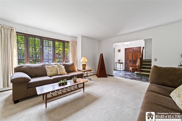 24 Castile Dr, Pomfret, NY 14063 - living area with light carpet, a baseboard radiator, stairs, and baseboards