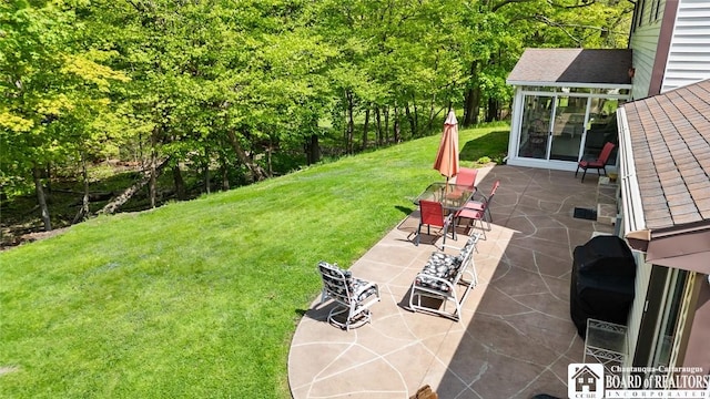 24 Castile Dr, Pomfret, NY 14063 - view of grassy yard with a patio