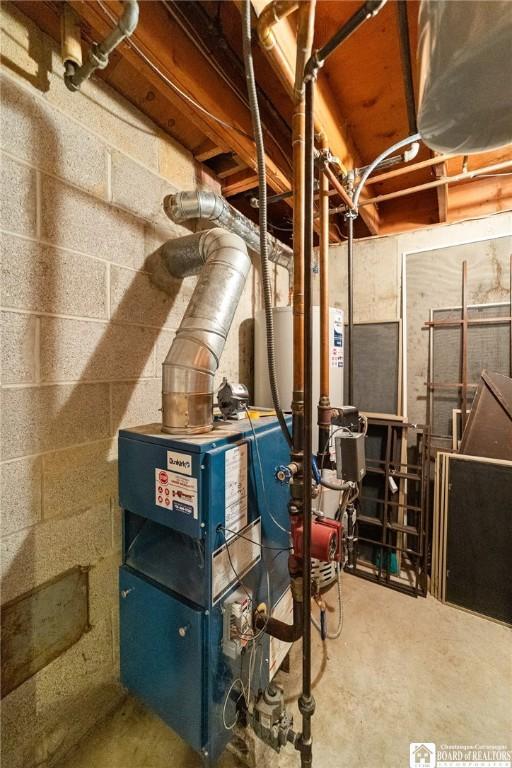 24 Castile Dr, Pomfret, NY 14063 - utility room featuring water heater