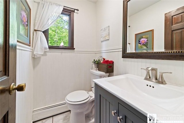 24 Castile Dr, Pomfret, NY 14063 - half bathroom with a baseboard radiator, toilet, a wainscoted wall, vanity, and tile patterned flooring