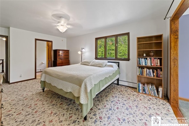 24 Castile Dr, Pomfret, NY 14063 - carpeted bedroom with a baseboard heating unit and baseboards