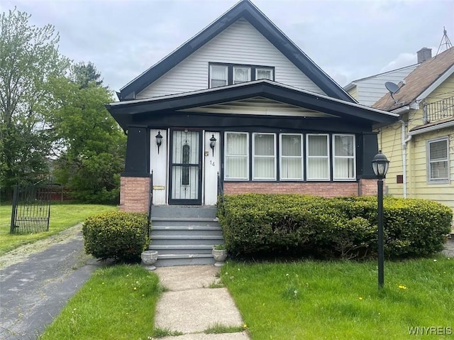 14 Thornton Ave, Buffalo, NY 14215 - view of front of house with brick siding and a front lawn