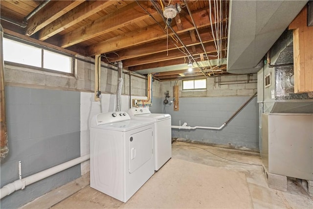 washroom with washer and clothes dryer and plenty of natural light
