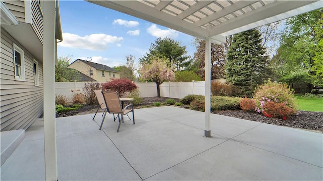 view of patio / terrace featuring a fenced backyard and a pergola