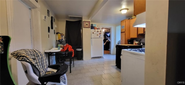 221 Grace St, Syracuse, NY 13204 - kitchen with white appliances, light tile patterned flooring, and under cabinet range hood