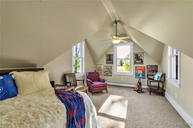 carpeted bedroom featuring a baseboard heating unit, lofted ceiling, baseboards, and a ceiling fan