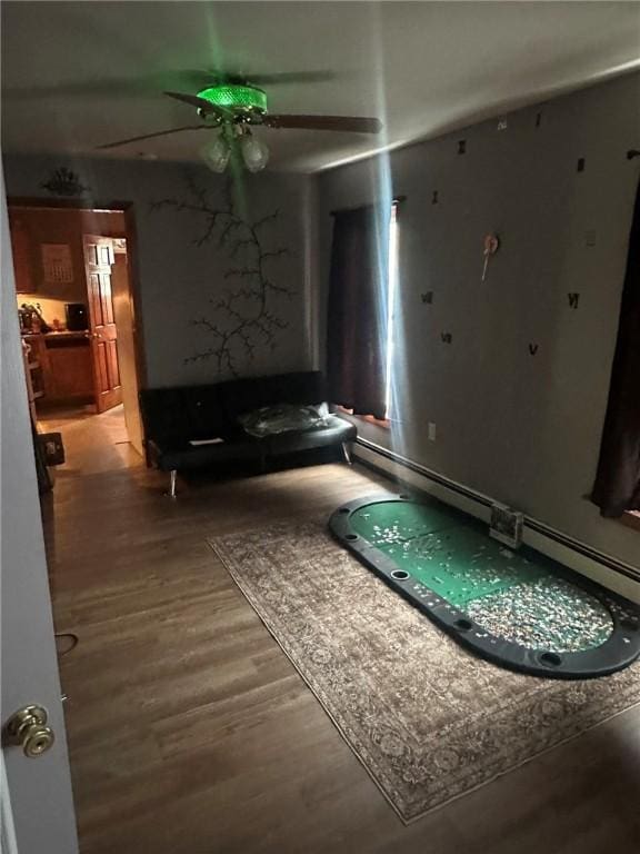 616 Reynolds St, Elmira-City, NY 14904 - living room featuring ceiling fan and wood finished floors