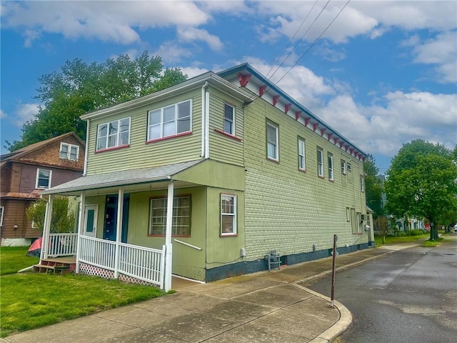 616 Reynolds St, Elmira-City, NY 14904 - view of side of home featuring a porch