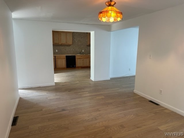 10713 Sisson Hwy, North Collins, NY 14057 - unfurnished dining area featuring baseboards and wood finished floors