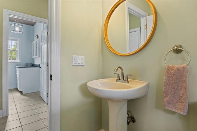 bathroom with tile patterned floors