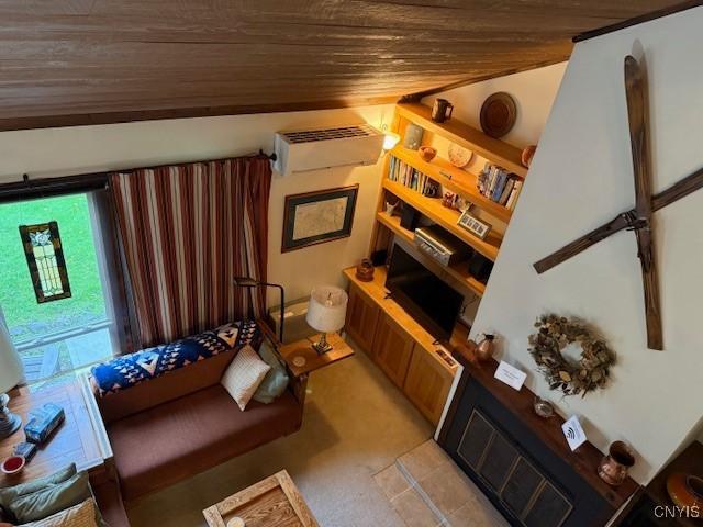 2128 Beta Dr Unit 21E, Virgil, NY 13045 - living area with wood ceiling, a wall unit AC, and light carpet