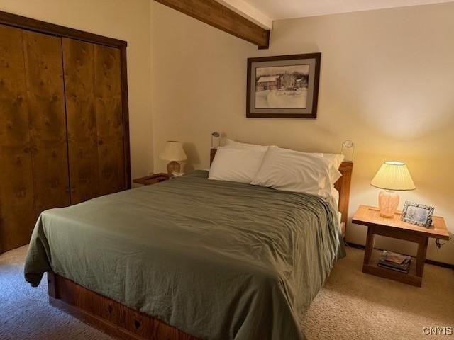 2128 Beta Dr Unit 21E, Virgil, NY 13045 - carpeted bedroom featuring beam ceiling