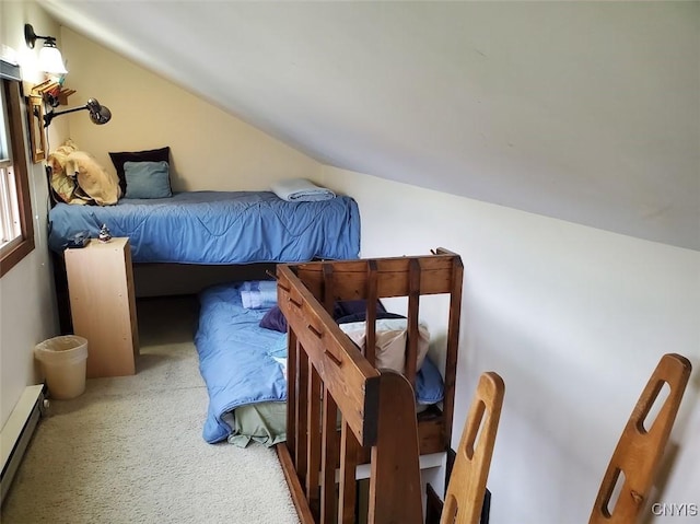 2128 Beta Dr Unit 21E, Virgil, NY 13045 - carpeted bedroom featuring baseboard heating and vaulted ceiling