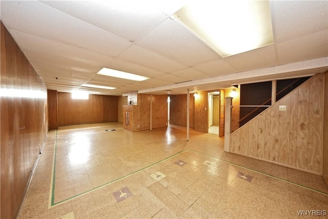 41 Della Dr, Lackawanna, NY 14218 - finished basement featuring tile patterned floors, wooden walls, and a drop ceiling