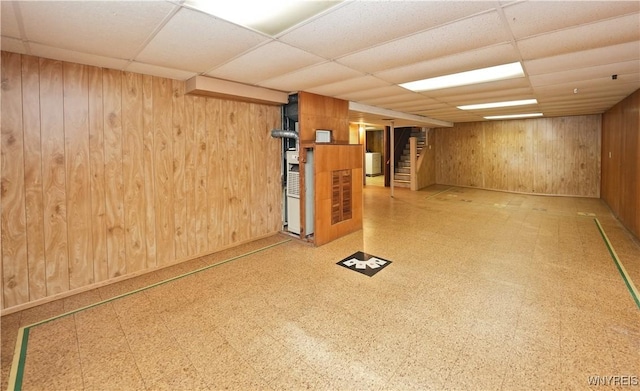 41 Della Dr, Lackawanna, NY 14218 - finished below grade area with a drop ceiling, tile patterned floors, wood walls, and stairs