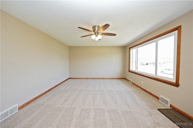 41 Della Dr, Lackawanna, NY 14218 - spare room featuring ceiling fan, light colored carpet, and baseboards