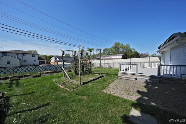 41 Della Dr, Lackawanna, NY 14218 - view of yard featuring a vegetable garden and a patio