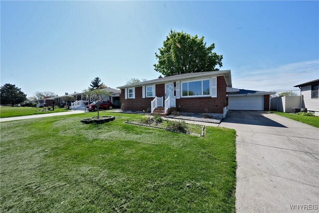 41 Della Dr, Lackawanna, NY 14218 - ranch-style house featuring brick siding and a front lawn