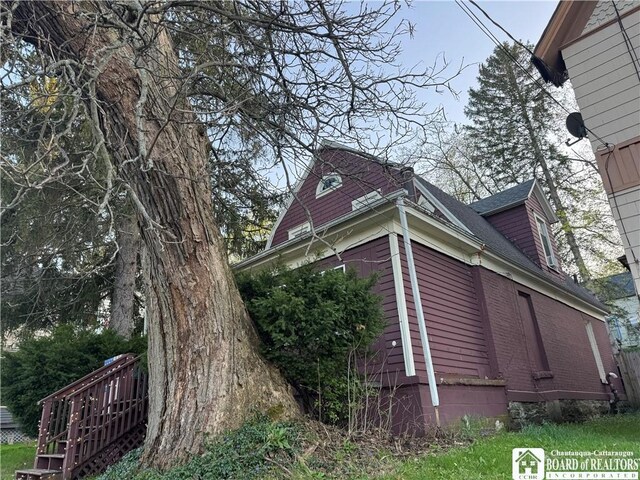 214 Hazzard St, Jamestown, NY 14701 - view of side of home with a shingled roof