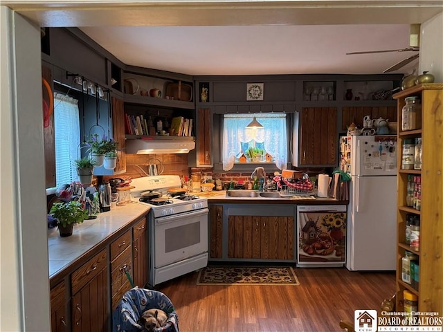 214 Hazzard St, Jamestown, NY 14701 - kitchen with white appliances, a sink, under cabinet range hood, open shelves, and dark wood-style flooring