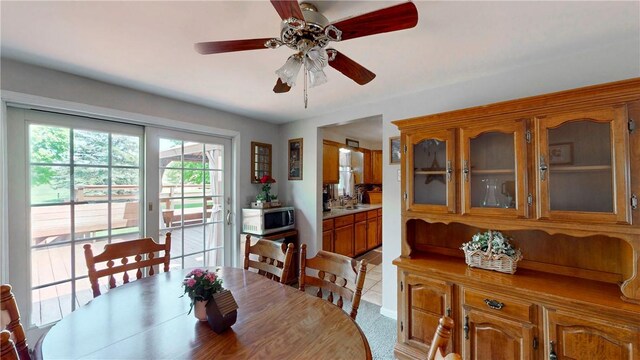 6 Club View Dr, Bath, NY 14810 - dining room with a ceiling fan
