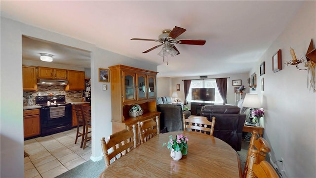 6 Club View Dr, Bath, NY 14810 - dining area featuring light tile patterned floors and ceiling fan