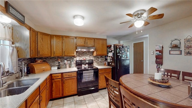 6 Club View Dr, Bath, NY 14810 - kitchen with black appliances, tasteful backsplash, ceiling fan, under cabinet range hood, and a sink