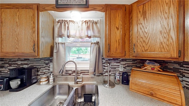 6 Club View Dr, Bath, NY 14810 - kitchen with a sink, decorative backsplash, light countertops, and brown cabinetry