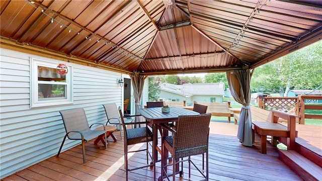 6 Club View Dr, Bath, NY 14810 - deck featuring a gazebo, outdoor dining space, and fence