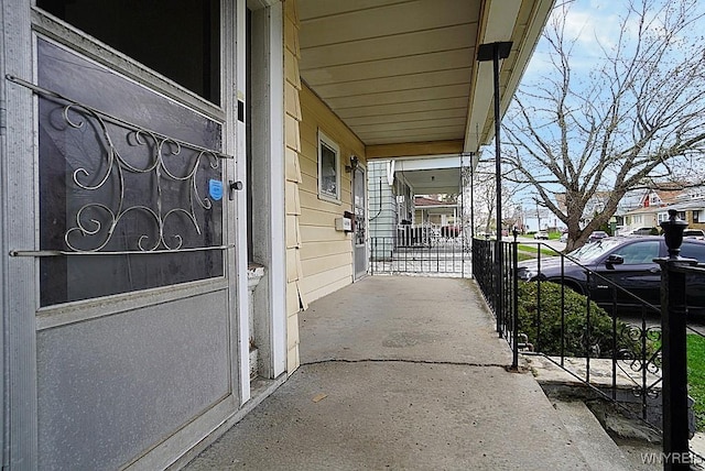 54 Pine Ridge Rd, Cheektowaga, NY 14211 - view of patio / terrace with a porch