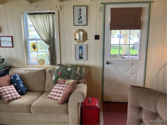 13202 Park Rd, Carlton, NY 14571 - living area with carpet floors and a decorative wall