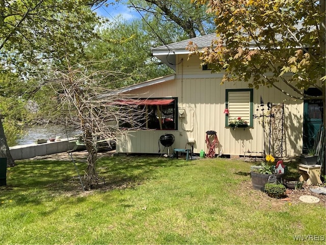 13202 Park Rd, Carlton, NY 14571 - rear view of house with a yard and a shingled roof