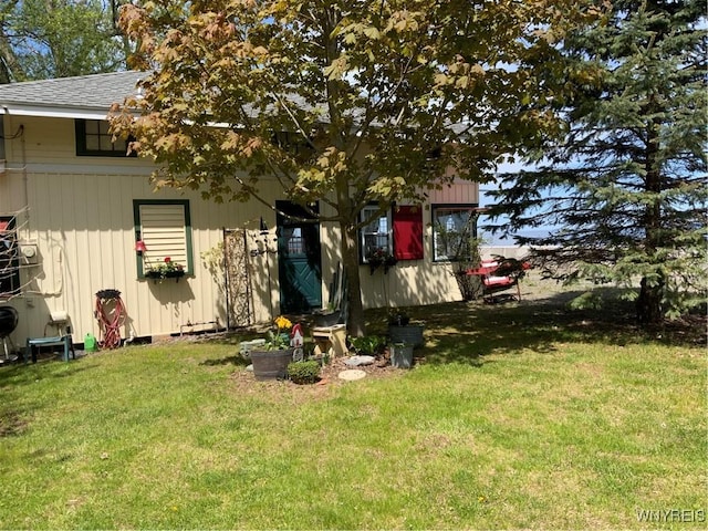 13202 Park Rd, Carlton, NY 14571 - view of front of property with a front yard and a shingled roof
