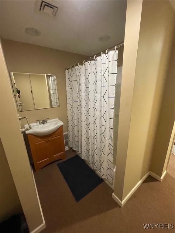 1068 Meiser Rd, Alabama, NY 14036 - bathroom featuring vanity and baseboards