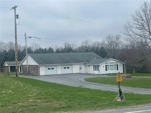1068 Meiser Rd, Alabama, NY 14036 - single story home featuring a front lawn and asphalt driveway