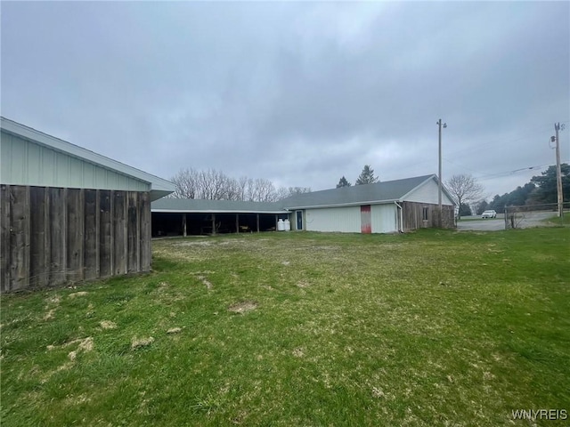 1068 Meiser Rd, Alabama, NY 14036 - view of grassy yard with a pole building and an outdoor structure