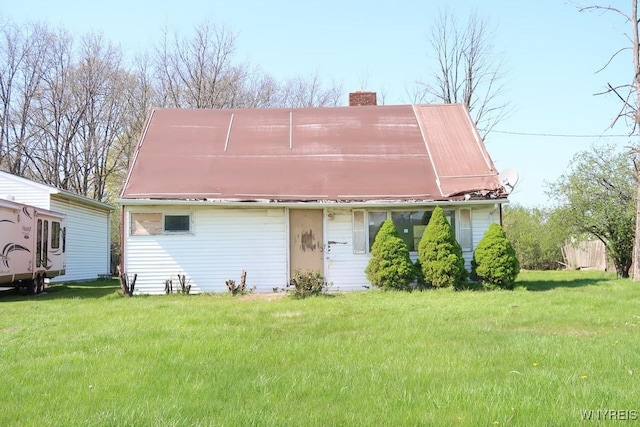 5910 Porter Rd, Niagara, NY 14304 - view of front of home featuring a chimney and a front yard
