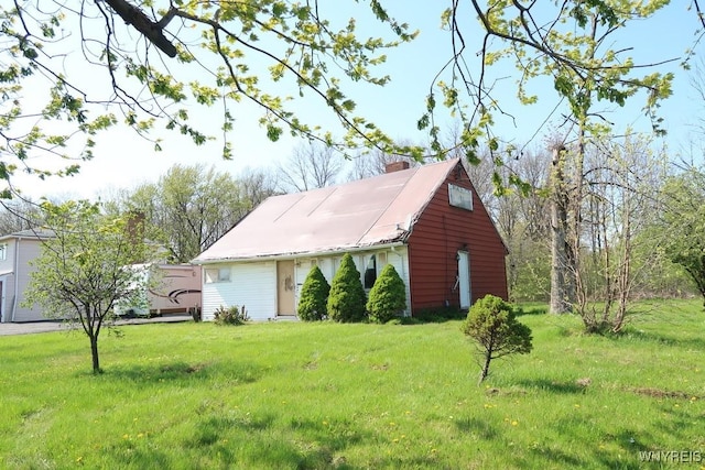 5910 Porter Rd, Niagara, NY 14304 - view of property exterior featuring a yard and a chimney